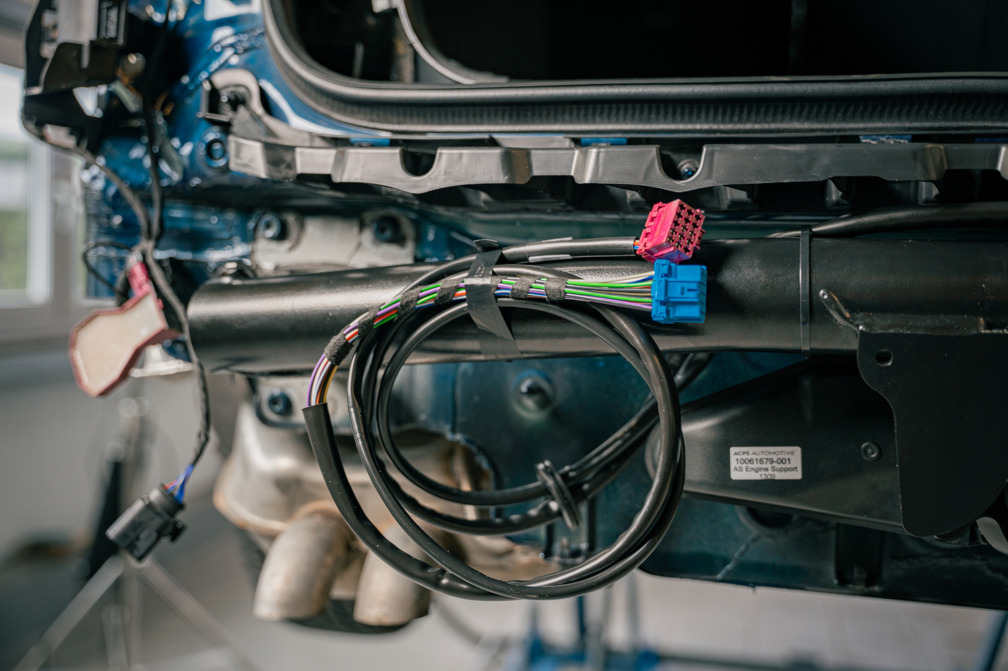 Vehicle-specific 13-pin wiring kit prepared for installation on an ORIS towbar system.