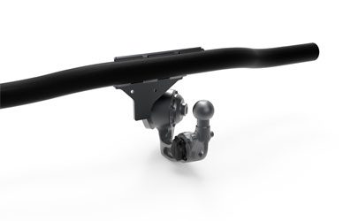 Illustration of the first manually swiveling ORIS towbar system mounted beneath a vehicle crossbar, showing the pioneering swivel mechanism and deployed towball position.